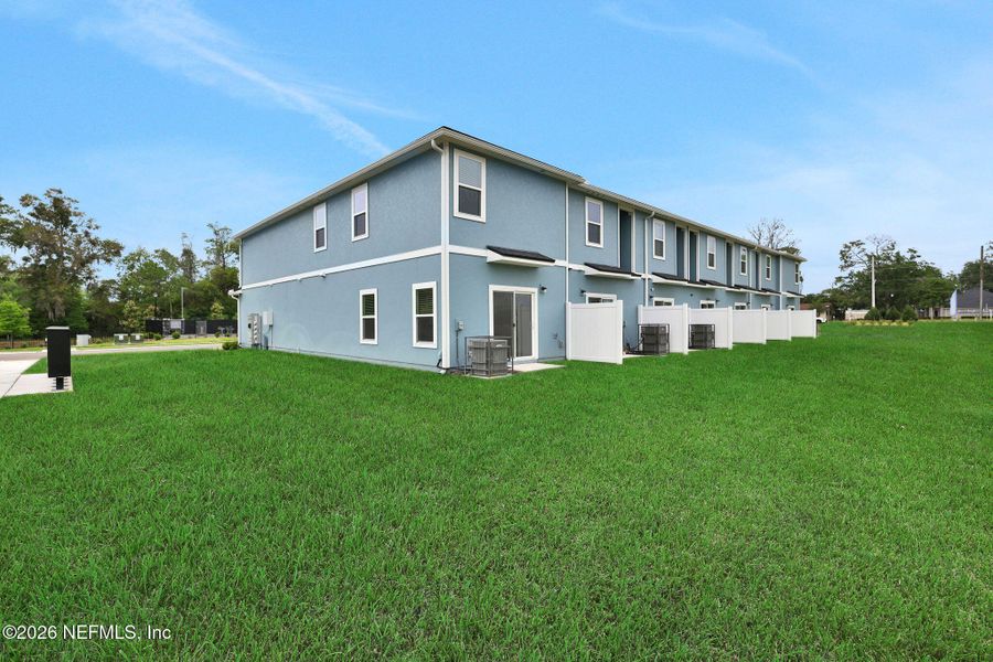 Exterior details and patio area of a home in Kasen Oaks, Jacksonville (Image 26).