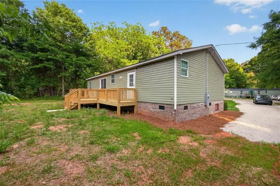 Exterior details and patio area of a home in , Loganville (Image 3).