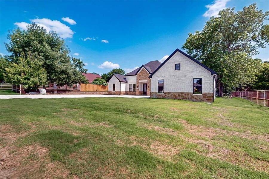 Front exterior of a new home in , Fort Worth, TX, highlighting curb appeal (Image 24).