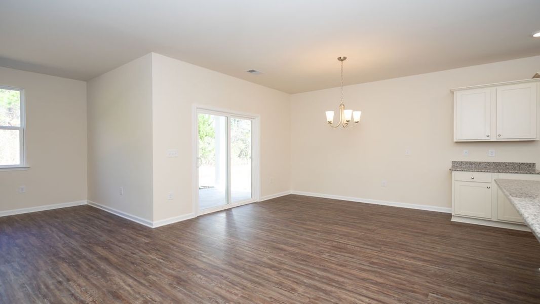 Representative unfurnished interior of a home built from the CALI by D.R. Horton in The Reserve at Wild Horse, Conway (Image 23).