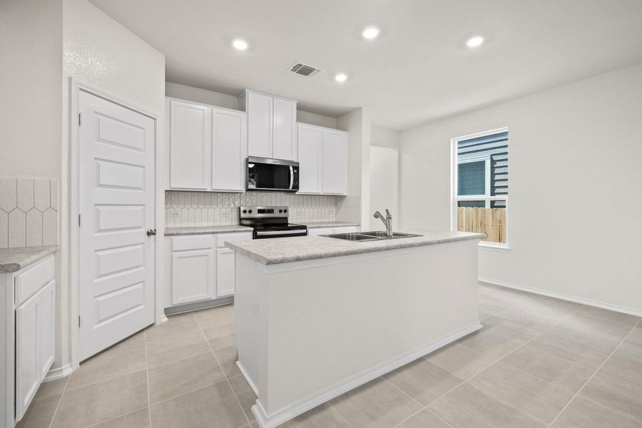 Furnished interior view inside a new home in Sonterra - Cool Water, Jarrell (Image 9).