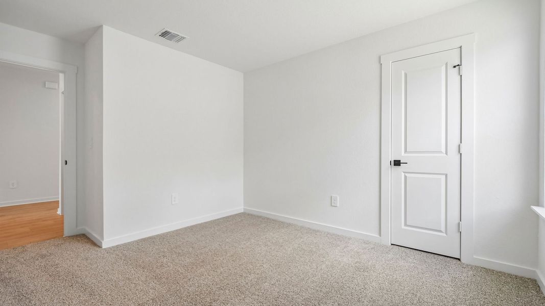 Spacious, unfurnished interior of a new home in Trails at Wildhorse, Austin (Image 26).