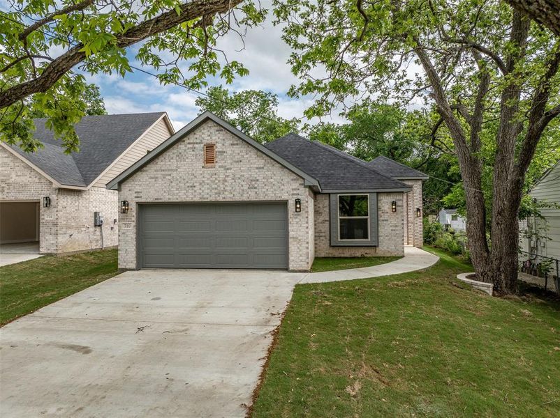 Front exterior of a new home in , Sherman, TX, highlighting curb appeal (Image 19).