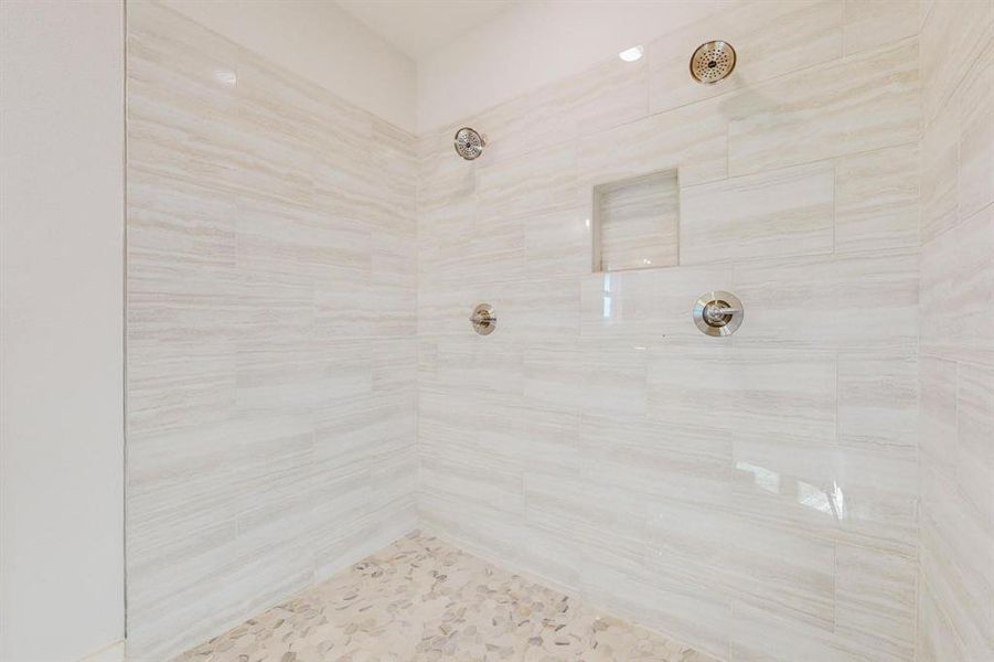 Bathroom with a tile shower