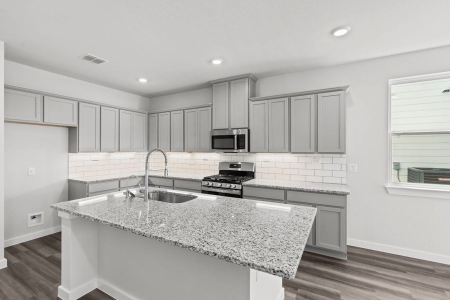 Furnished interior view inside a new home in The Meadows at Hunters Ranch, San Antonio (Image 7).