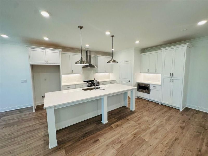 Large kitchen in this Townhome here at Evanshire