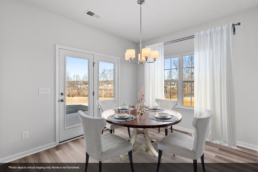 Furnished interior view inside a new home in Fieldstone, Lexington (Image 8).