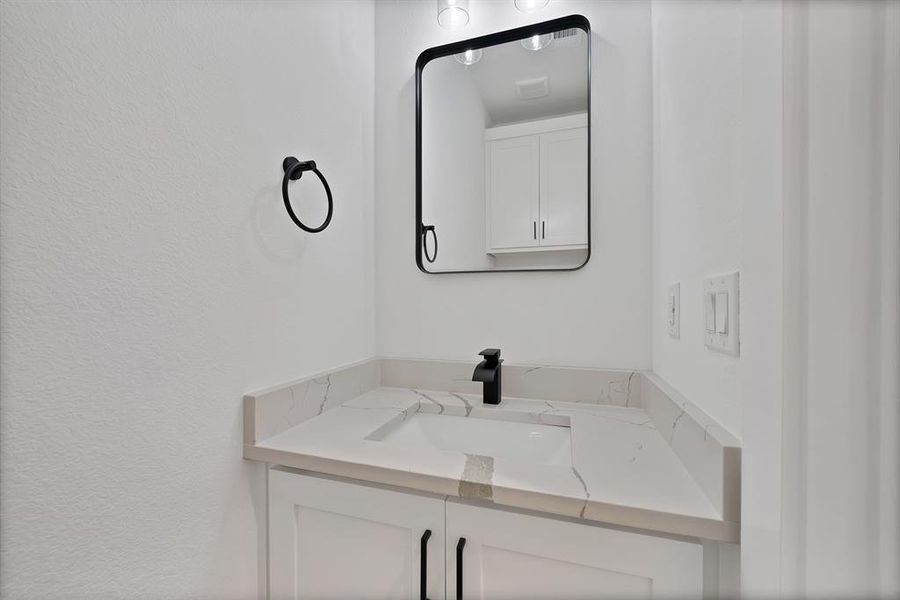 Bathroom featuring vanity