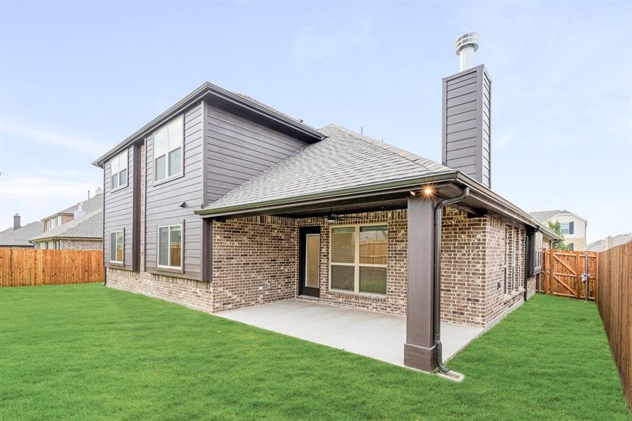 Front exterior of a new home in West Crossing, Anna, TX, highlighting curb appeal (Image 24). Front exterior of a new home in West Crossing, Anna, TX, highlighting curb appeal (Image 24).