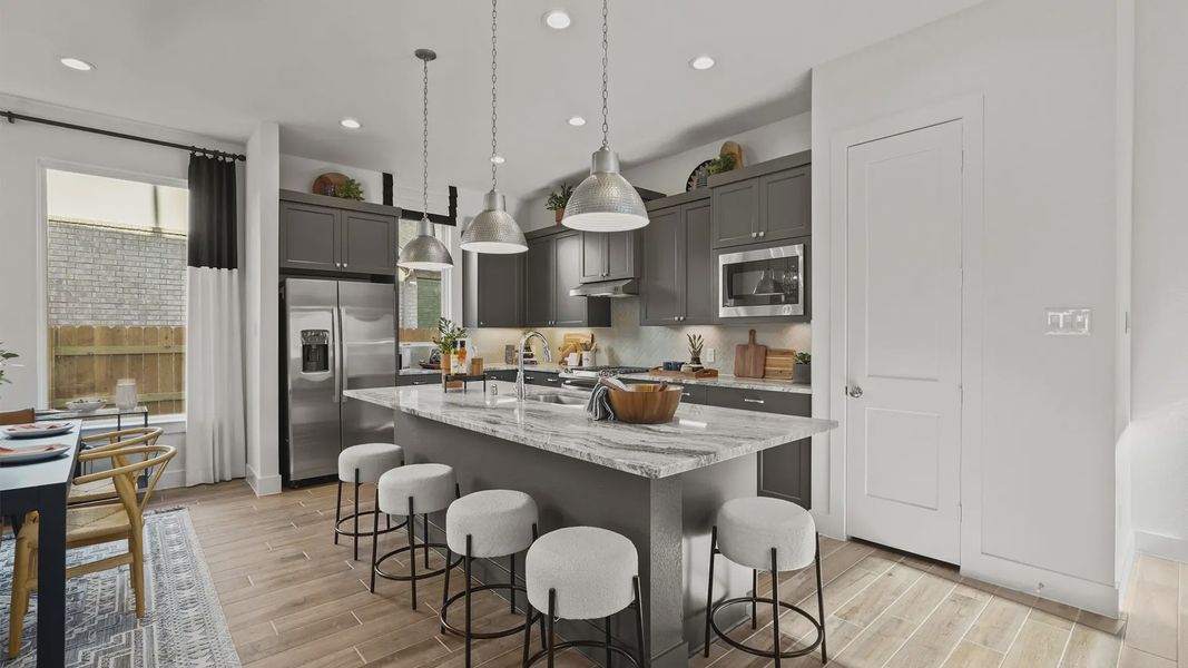 Representative furnished interior of a home built from the Medina by Chesmar Homes in Elyson 50's, Katy (Image 10).