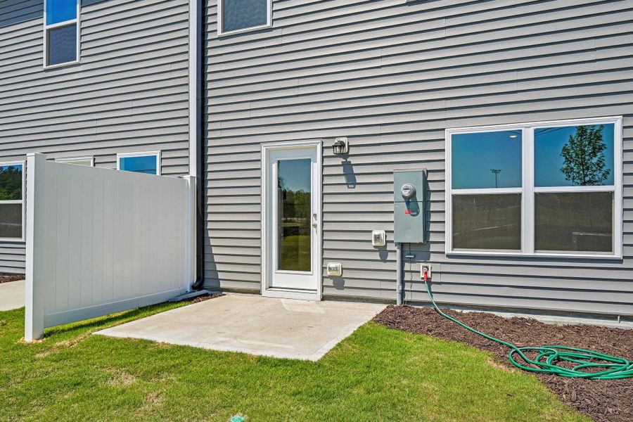 Exterior details and patio area of a home in Towns at The Point, Rolesville (Image 4).