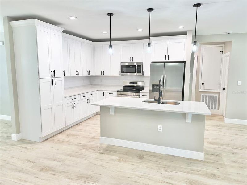 Furnished interior view inside a new home in , Port Charlotte (Image 5).