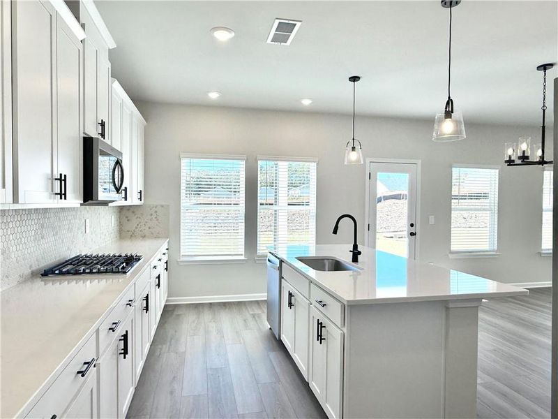 Furnished interior view inside a new home in Vines at Mill Creek - Estate Series, Braselton (Image 8). Furnished interior view inside a new home in Vines at Mill Creek - Estate Series, Braselton (Image 8).