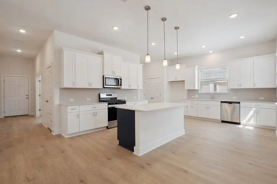 Furnished interior view inside a new home in Sage Hollow, Kyle (Image 7). Furnished interior view inside a new home in Sage Hollow, Kyle (Image 7).