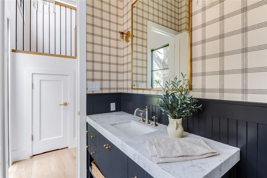 Bathroom featuring vanity and hardwood / wood-style flooring