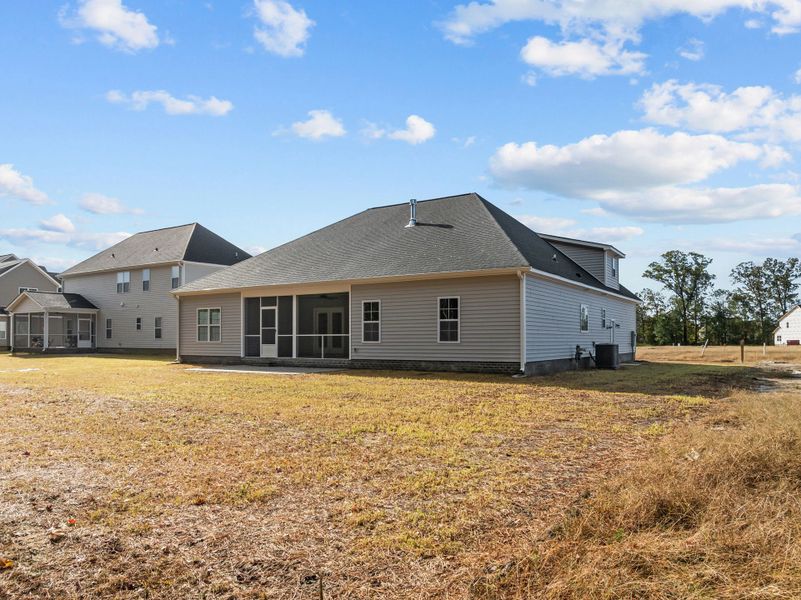Exterior details and patio area of a home in The Preserve at Langston, Winterville (Image 26). Exterior details and patio area of a home in The Preserve at Langston, Winterville (Image 26).