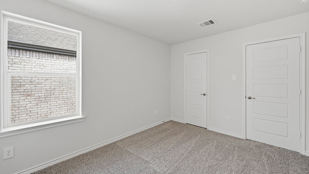 Representative unfurnished interior of a home built from the Jackson by D.R. Horton in Windchime, Celina (Image 13).