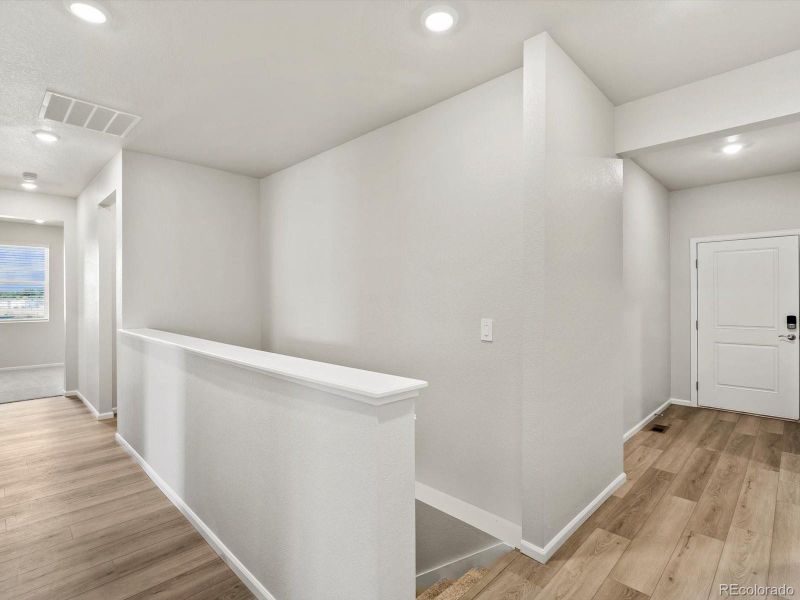 Spacious, unfurnished interior of a new home in Poudre Heights: The Alpine Collection, Windsor (Image 16). Spacious, unfurnished interior of a new home in Poudre Heights: The Alpine Collection, Windsor (Image 16).