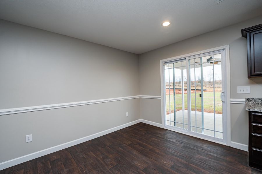 Representative unfurnished interior of a home built from the Saxon by Enchanted Homes in Guadalupe Heights, Seguin (Image 43).