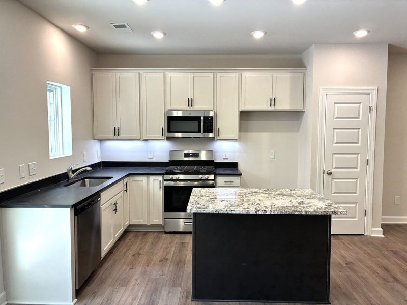 Furnished interior view inside a new home in Miller Park, Greenville (Image 7).