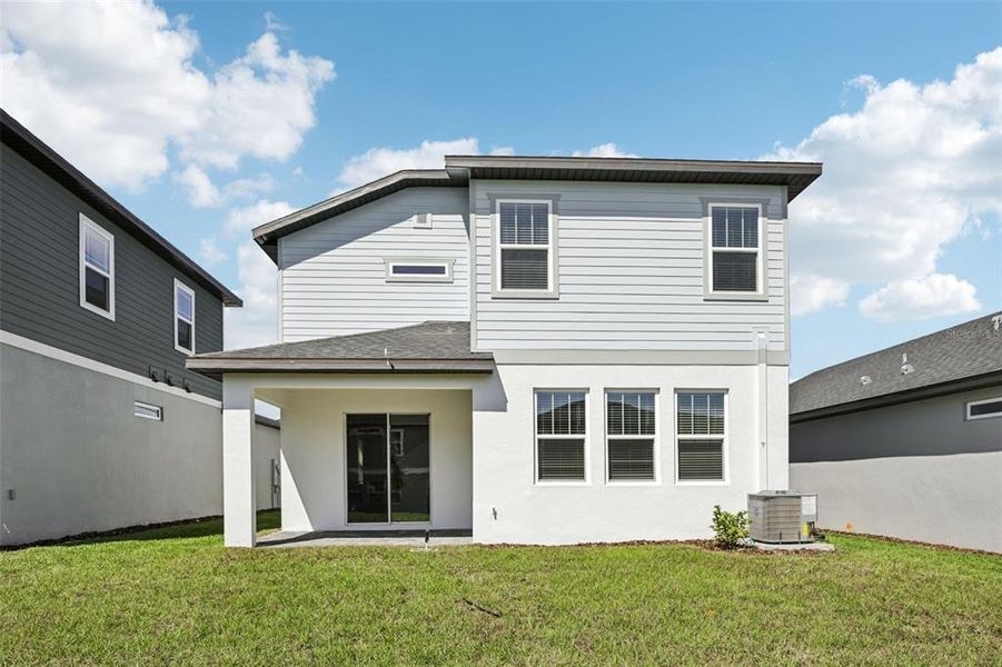 Exterior details and patio area of a home in Cyrene at Minneola, Minneola (Image 23).