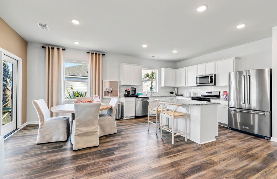 Enjoy the open floorplan concept with hardwood floors.