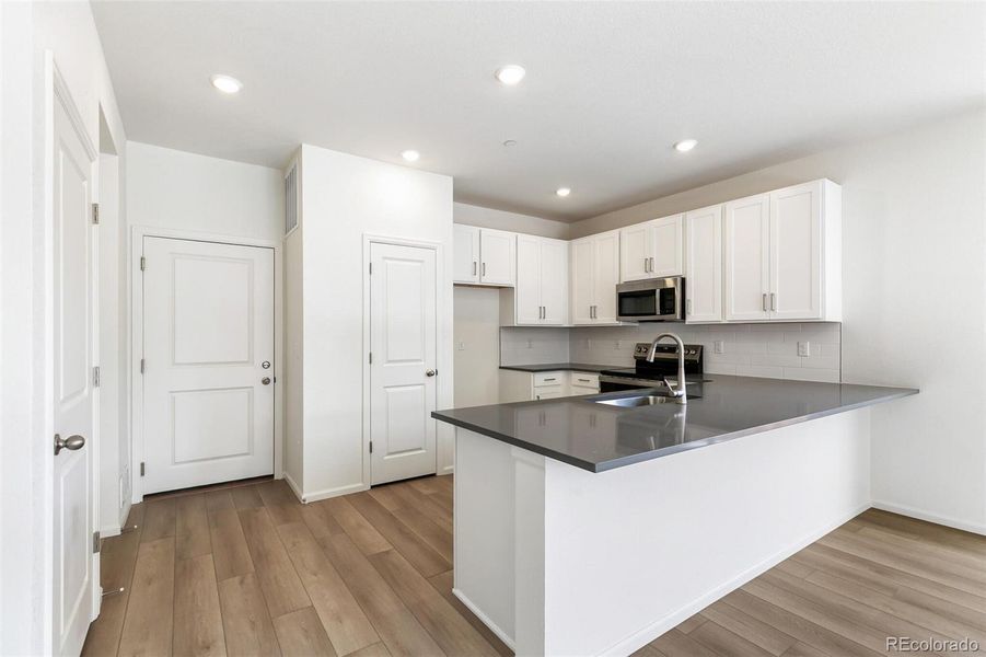 Furnished interior view inside a new home in Turnberry, Commerce City (Image 8).