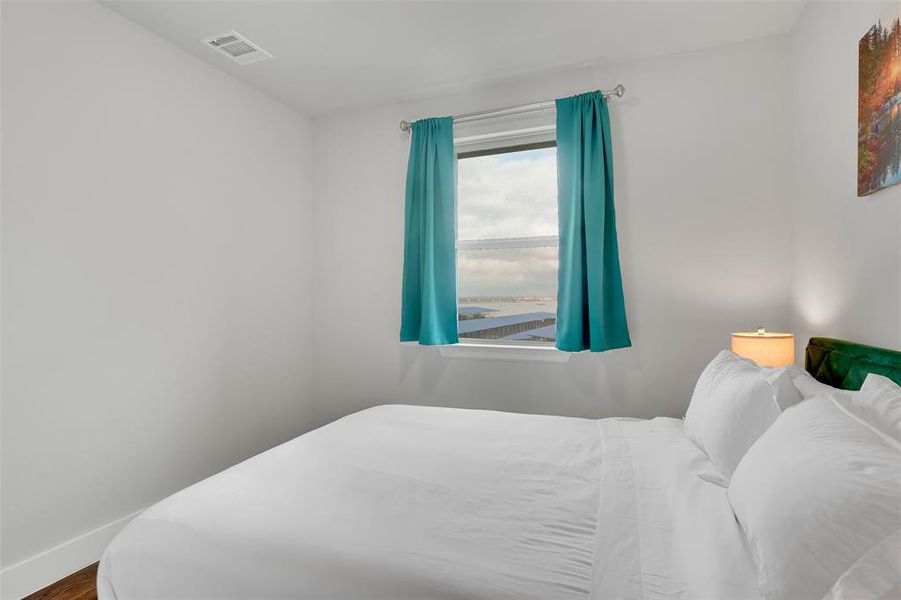 Bedroom featuring baseboards