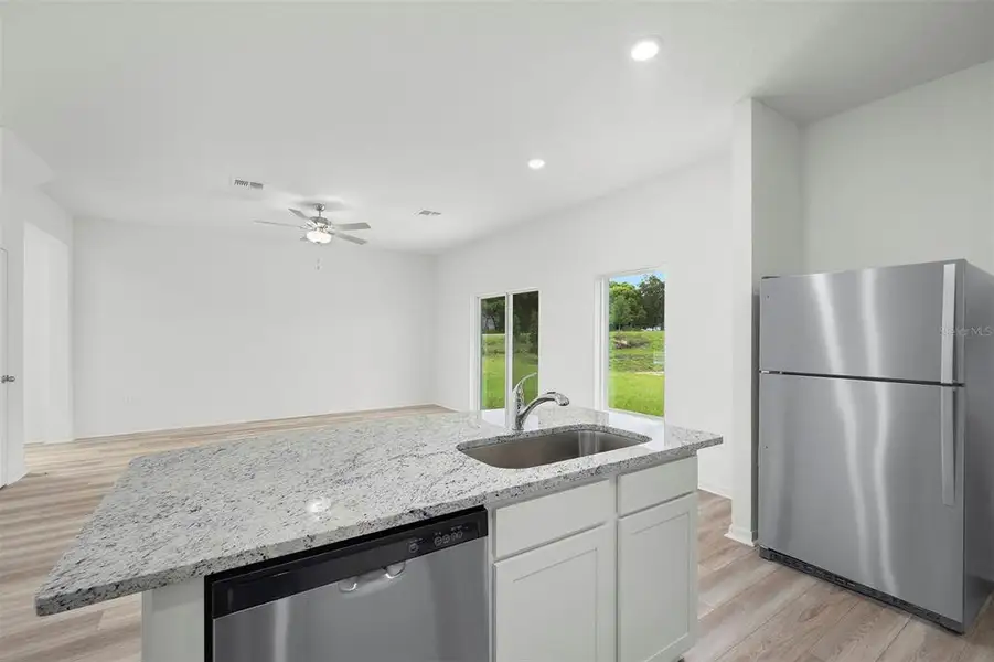 Furnished interior view inside a new home in , Astatula (Image 5).