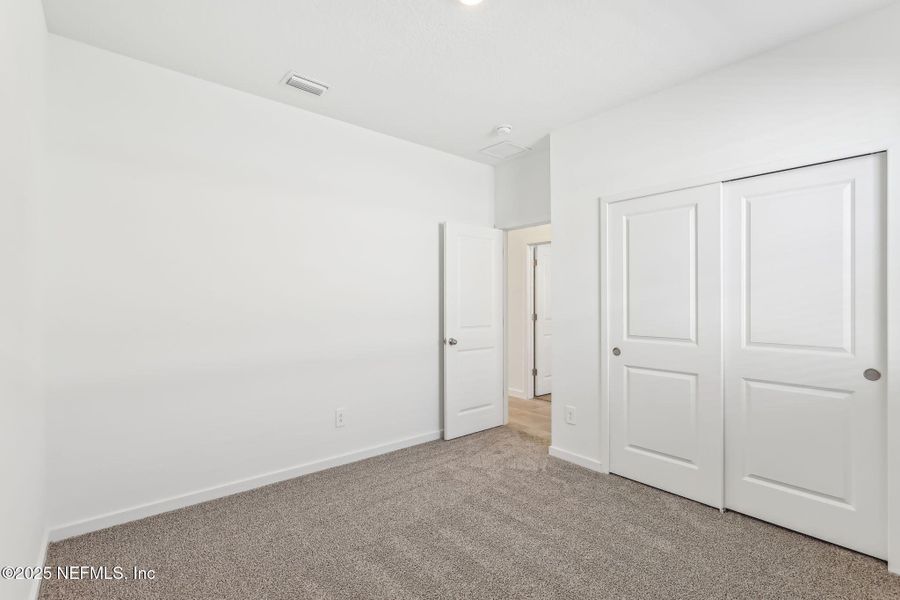 Spacious, unfurnished interior of a new home in Lakes at Bella Lago - Signature Series, Green Cove Springs (Image 30). Spacious, unfurnished interior of a new home in Lakes at Bella Lago - Signature Series, Green Cove Springs (Image 30).