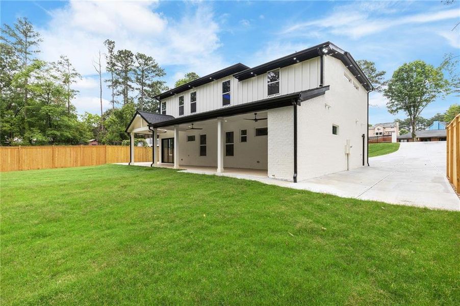 Front exterior of a new home in , Lilburn, GA, highlighting curb appeal (Image 32).