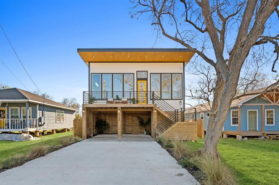 This stunning 4-bedroom, 2-bath home offers modern coastal living at its finest.