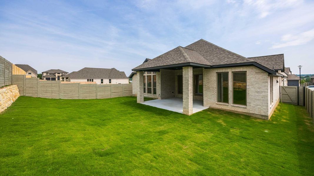 Bonus room featuring vaulted ceiling, carpet, and baseboards Bonus room featuring vaulted ceiling, carpet, and baseboards