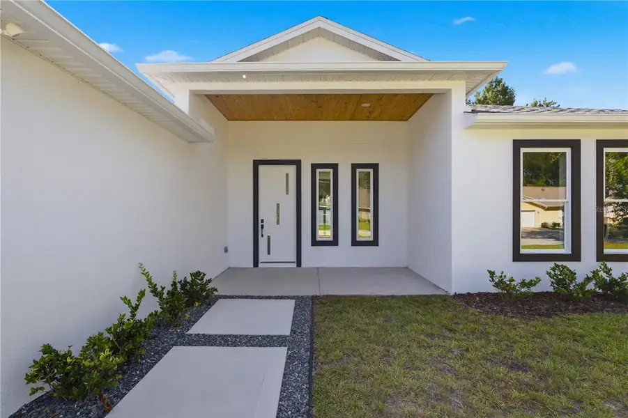Exterior details and patio area of a home in , Palm Coast (Image 3). Exterior details and patio area of a home in , Palm Coast (Image 3).