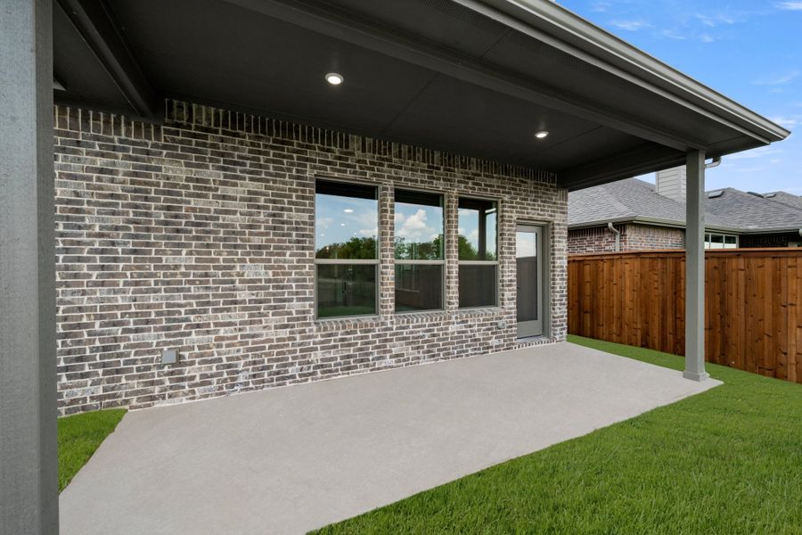 Exterior details and patio area of a home in Silo Mills, Joshua (Image 3).