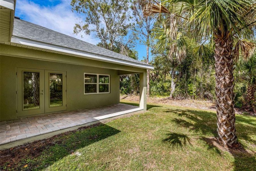 Exterior details and patio area of a home in , Englewood (Image 25).