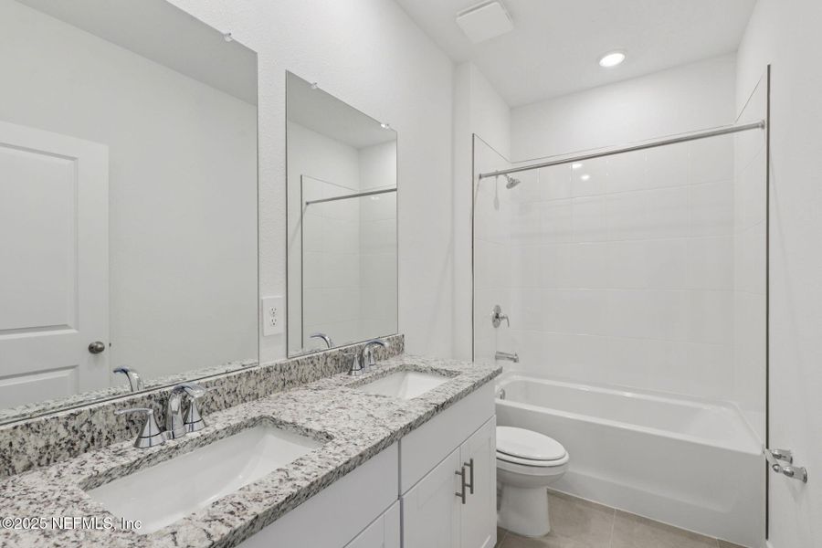 Furnished interior view inside a new home in Lakes at Bella Lago - Signature Series, Green Cove Springs (Image 9). Furnished interior view inside a new home in Lakes at Bella Lago - Signature Series, Green Cove Springs (Image 9).