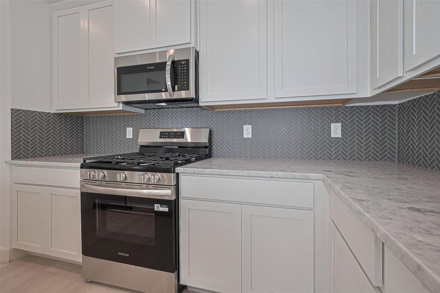 Furnished interior view inside a new home in Regents Court, Houston (Image 9).