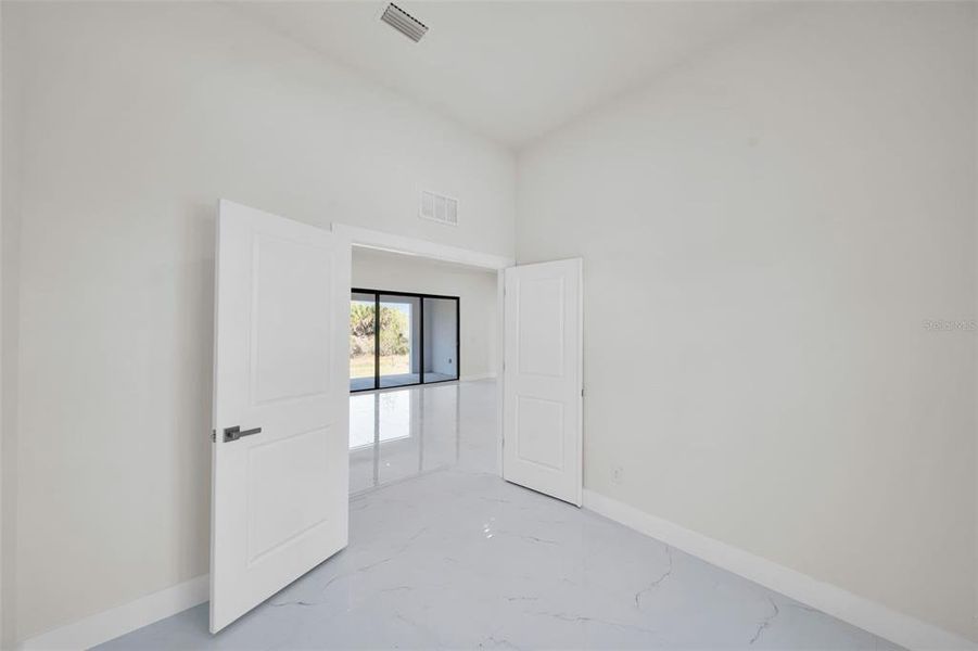 Spacious, unfurnished interior of a new home in , Port Charlotte (Image 21).