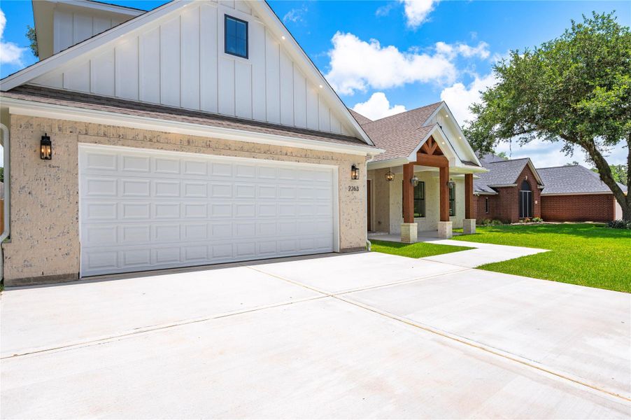 Front exterior of a new home in , West Columbia, TX, highlighting curb appeal (Image 27).