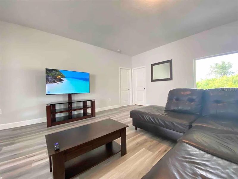 Furnished interior view inside a new home in , Port Charlotte (Image 4).