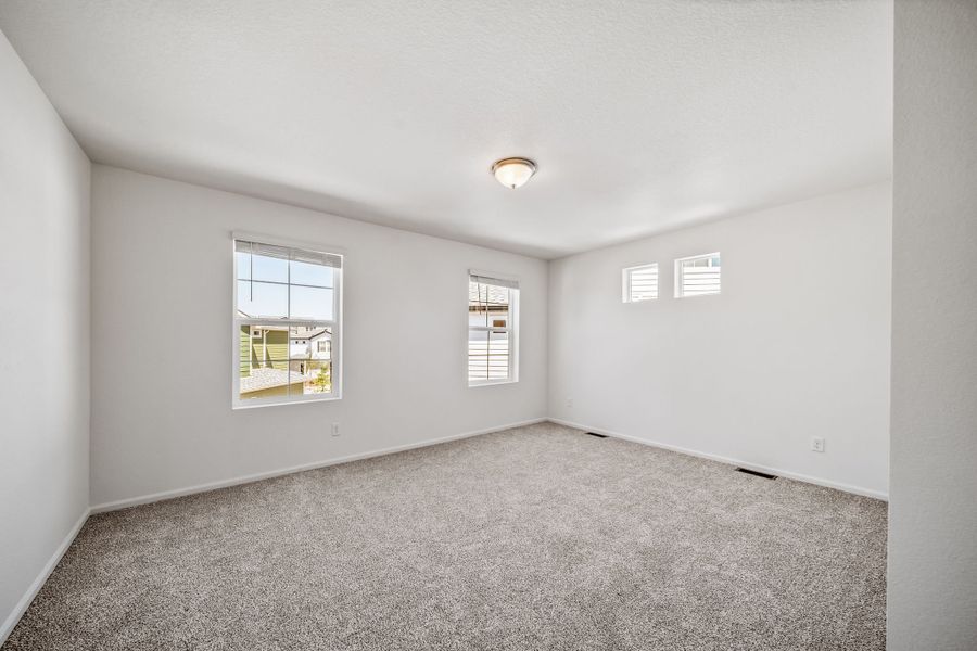 Spacious, unfurnished interior of a new home in Muegge Farms, Bennett (Image 13).