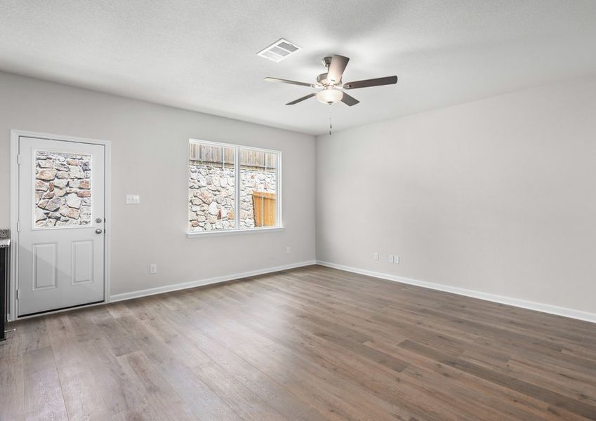 The family room is spacious and has plenty of space for furniture.
