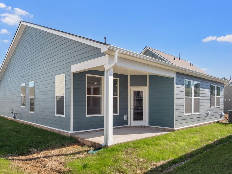 Exterior details and patio area of a home in Sage Farms, White House (Image 22).