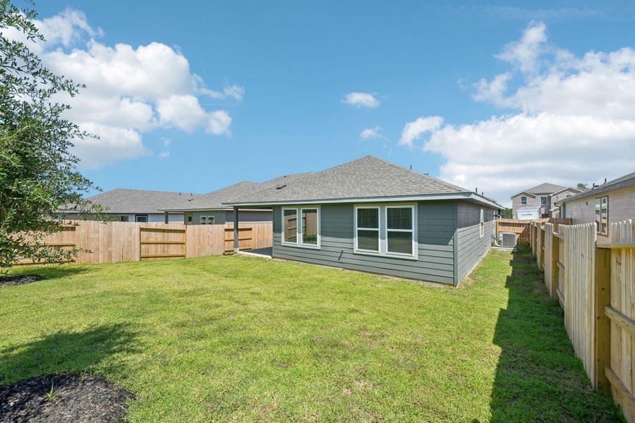 Exterior details and patio area of a home in Pine Lake Cove - Premier Series, Montgomery (Image 5).