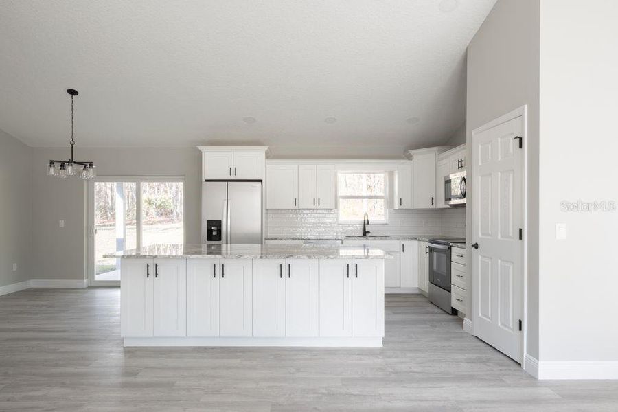 Furnished interior view inside a new home in , Citrus Springs (Image 14).