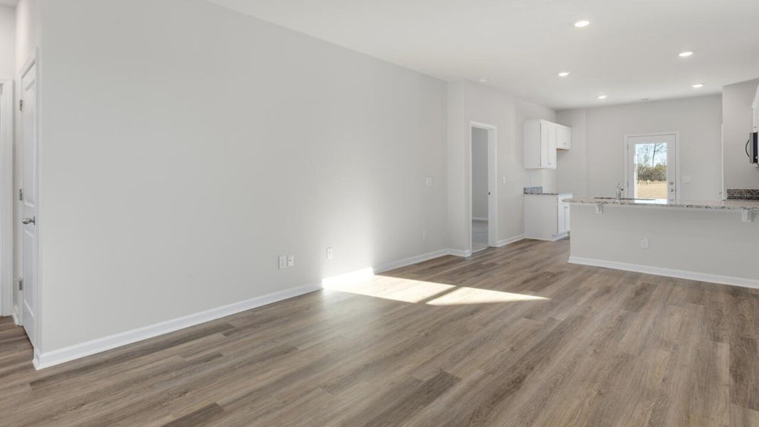 Representative unfurnished interior of a home built from the DELANEY by D.R. Horton in The Cottages at Blake Farm, Wilmington (Image 10). Representative unfurnished interior of a home built from the DELANEY by D.R. Horton in The Cottages at Blake Farm, Wilmington (Image 10).