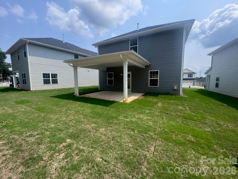 Exterior details and patio area of a home in Village at Parkside, Gastonia (Image 3).