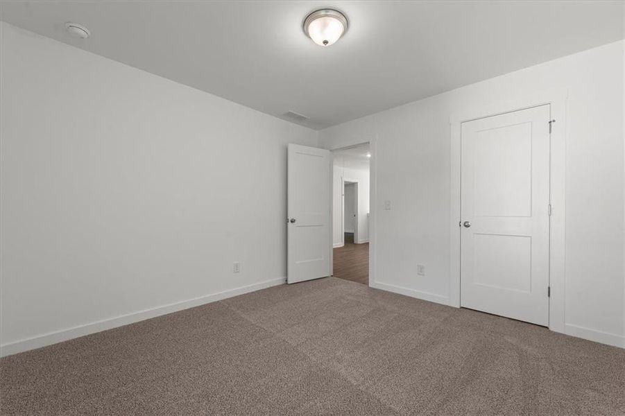 Spacious, unfurnished interior of a new home in Ellington Farms, Statham (Image 32). Spacious, unfurnished interior of a new home in Ellington Farms, Statham (Image 32).