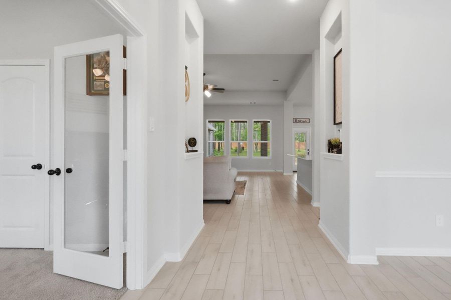 Bright entryway with light flooring and a clean, open layout leading into the main living areas.